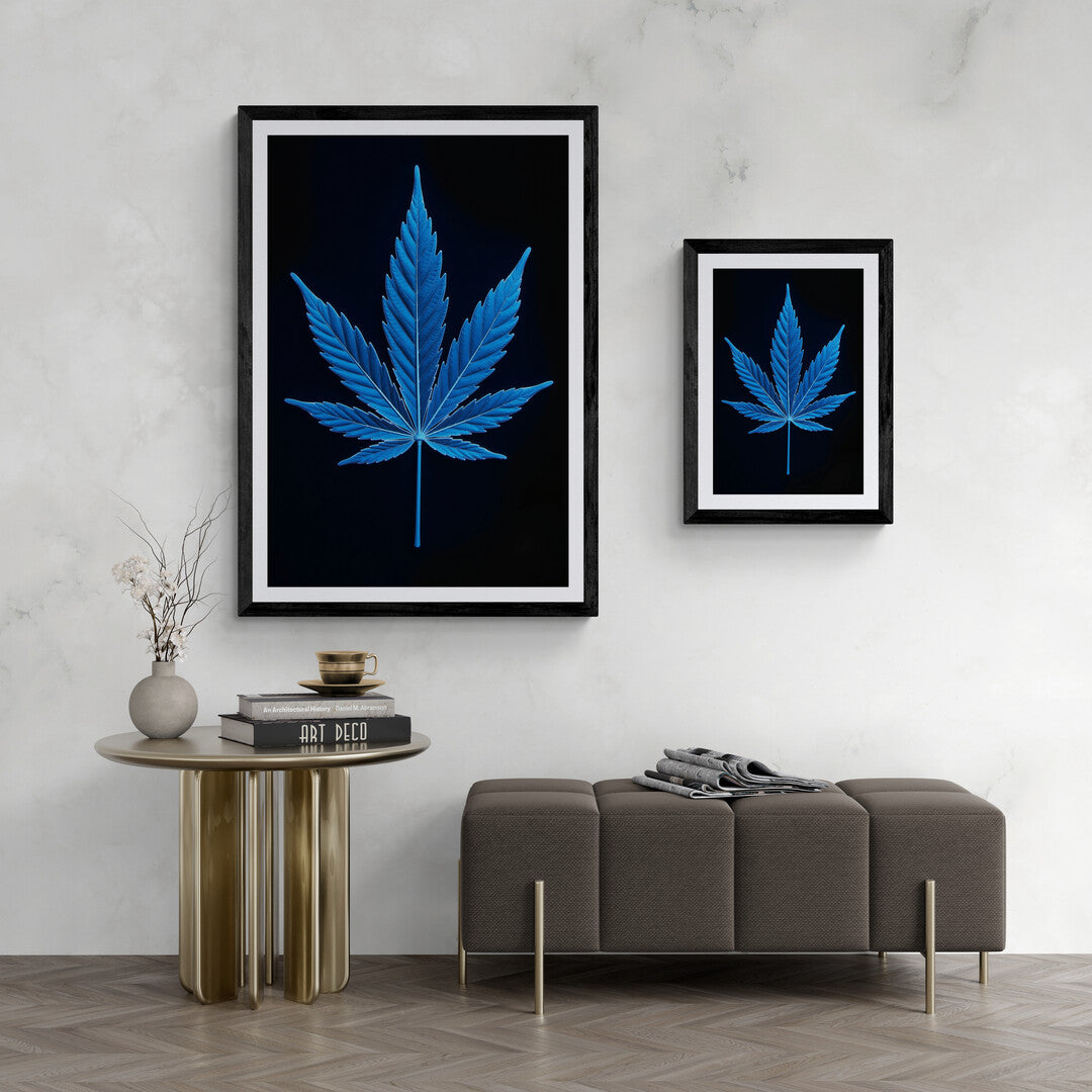 The image shows a highly stylized and detailed representation of a leaf, resembling a cannabis or hemp leaf, but rendered in an electric blue color. The leaf is presented against a dark, nearly black background, which makes the vibrant blue hue stand out dramatically.